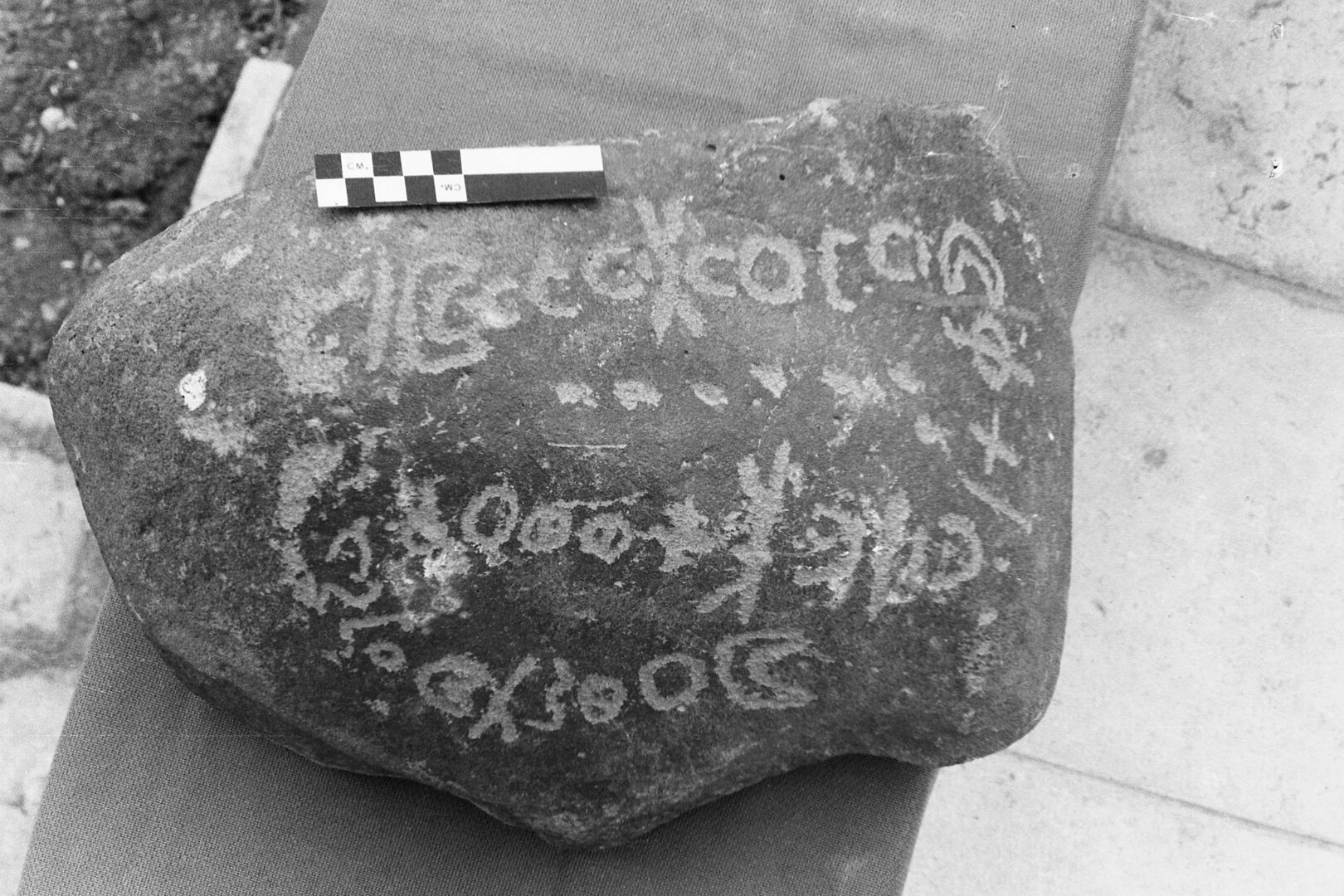 inscription of siglum MSTJ 21