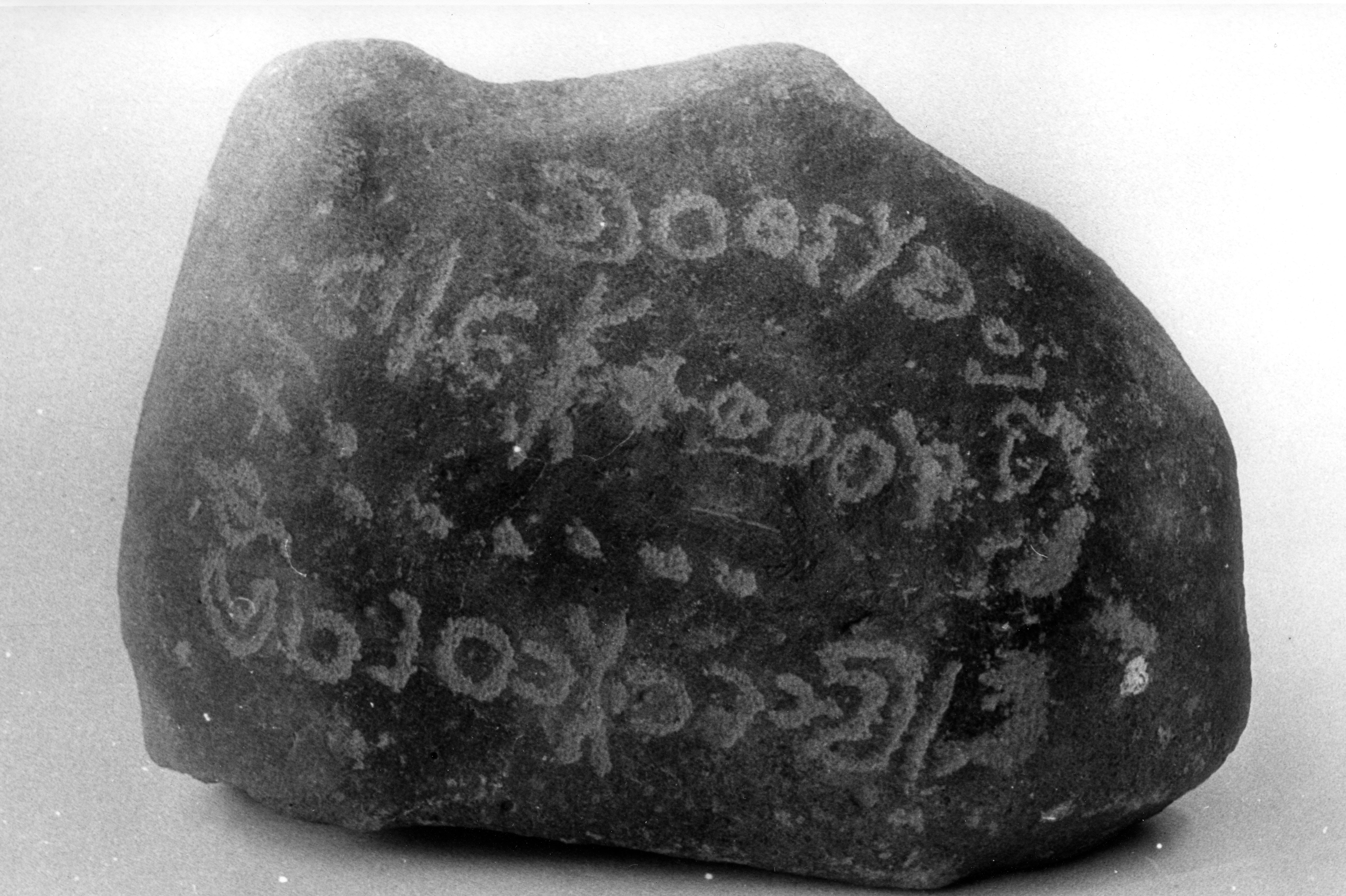 inscription of siglum MSTJ 21