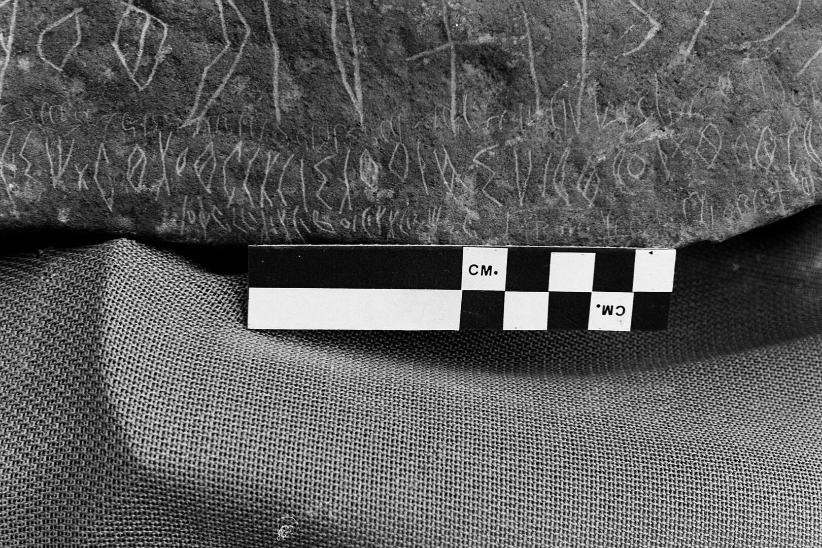 inscription of siglum MSTJ 9